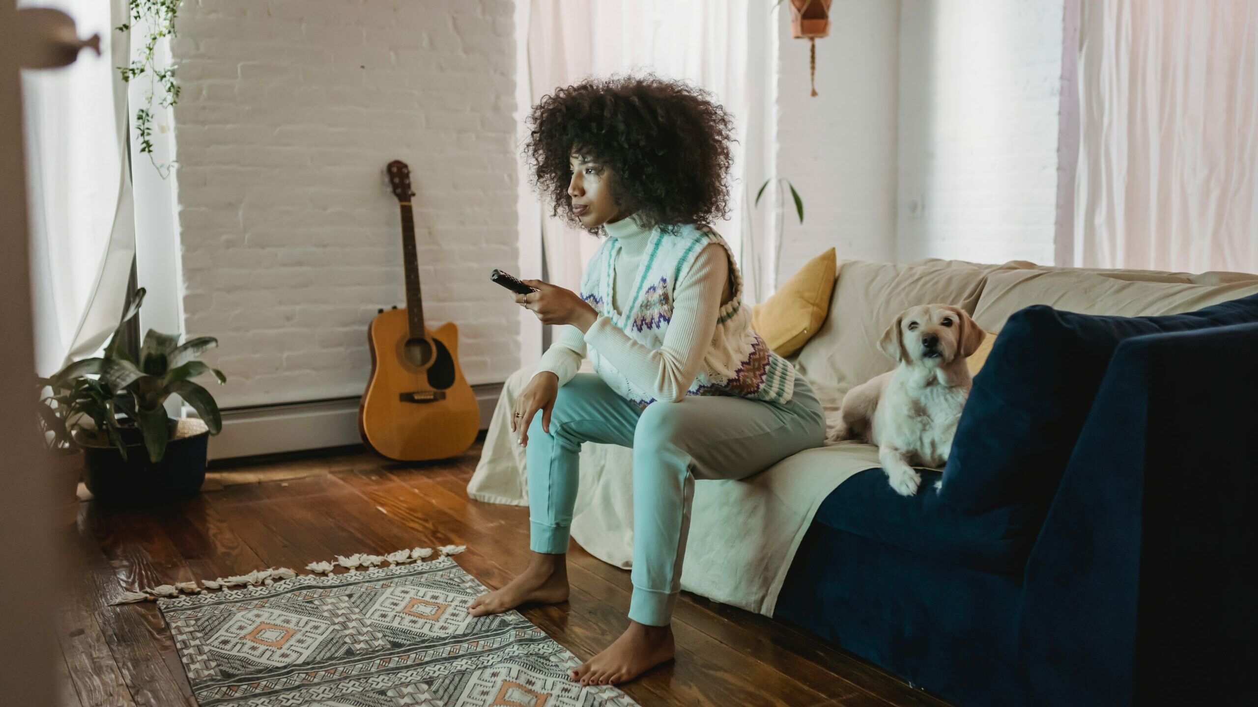 Black woman watching a black streaming service.